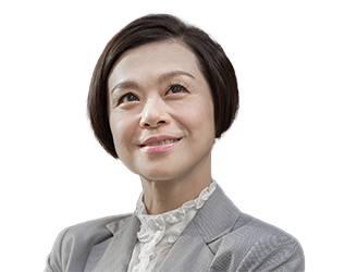 smiling woman in suit jacket professional