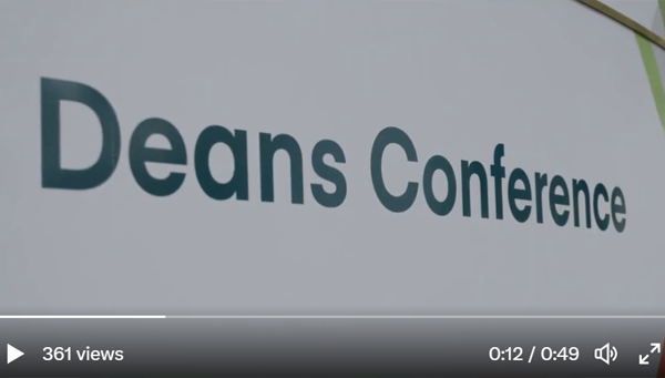 Photo of still video shot from AACSB 2023 Deans Conference, with 