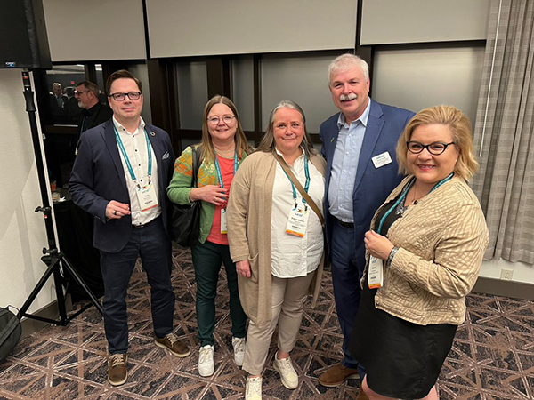 Photo of attendees at AACSB 2023 Deans Conference, including Ron Tuninga, Saara Julkunen, and three others. Taken by Saara Julkunen.
