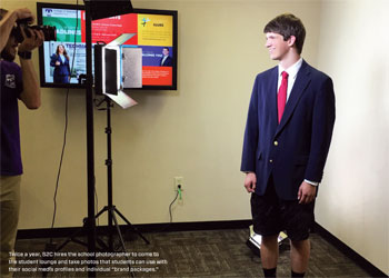Photo of young man wearing business suit on upper body and shorts on bottom, posing in front of camera. Courtesy of Tennessee Tech Marketing and Communications Department.